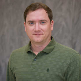 Alexander Samoylov’s headshot.