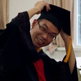 Jian Tan’s headshot.