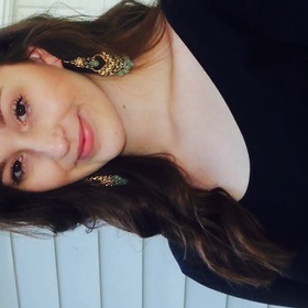 Taylor Sinclair’s headshot.
