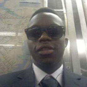 Derek Tawiah’s headshot.