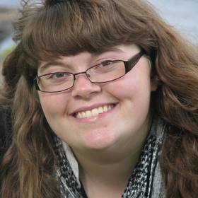 Molly Tishberg’s headshot.