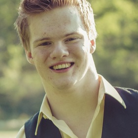 Christopher Tombs’ headshot.