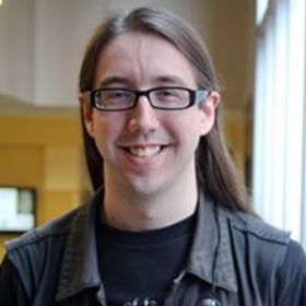 Zachary Gibson’s headshot.