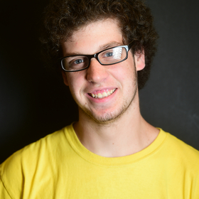 Brett Weber’s headshot.
