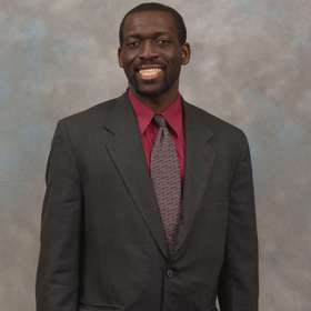 Snotti St. Cyr’s headshot.