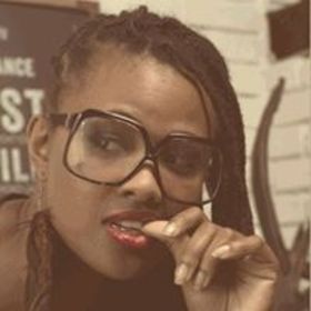 Adrienne Babb’s headshot.