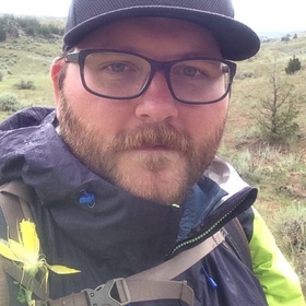 Kyle Marchman’s headshot.