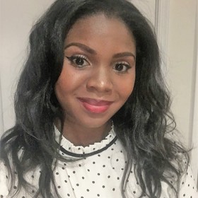 Sabrina James’ headshot.