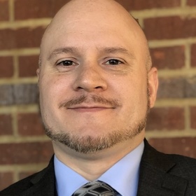 Marcus Demmer’s headshot.