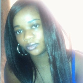 Cynthia Mukendi’s headshot.