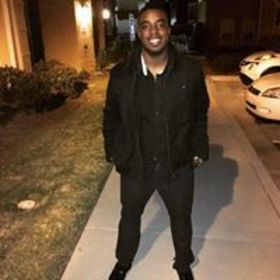 Justin Otiwu’s headshot.