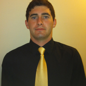 Michael Barrett’s headshot.