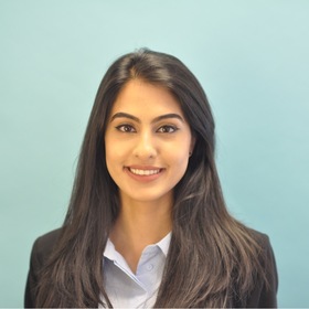 Mesha Mesiya’s headshot.