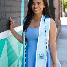 Ely Compres’ headshot.