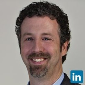 Matthew Dooley’s headshot.