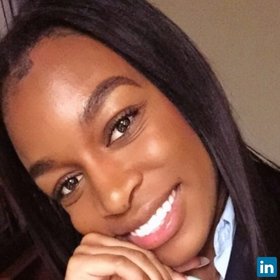 Zuri May’s headshot.