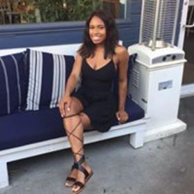 Tazhane Simmons’ headshot.