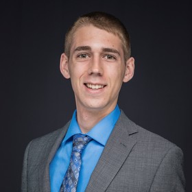 Derek Watson’s headshot.