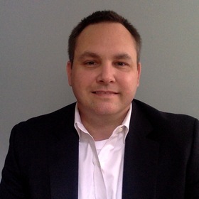 Brett Byrnes’ headshot.