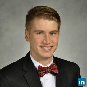 Gregory Miller’s headshot.