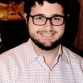 Zachary Greenfield’s headshot.