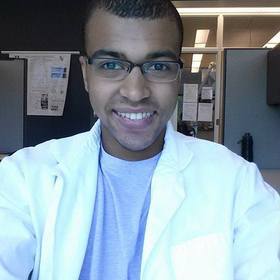 Nicolas Watkins’ headshot.