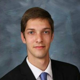 Mitchell Kelman’s headshot.