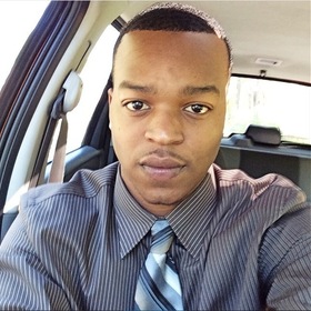 C'Quinn Tolbert’s headshot.