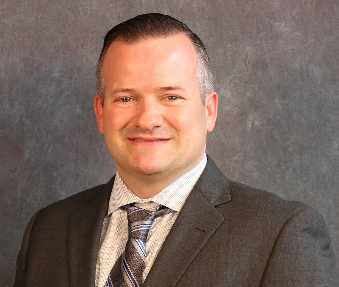 Placeholder headshot for Charles Langley.