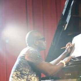 Dennis Brown’s headshot.