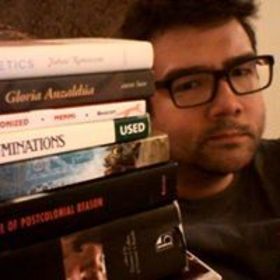 David St. John’s headshot.