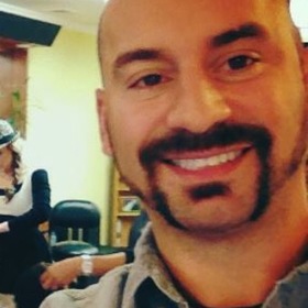 Mark Lares’ headshot.