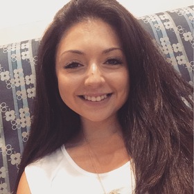 Mary Estavillo’s headshot.