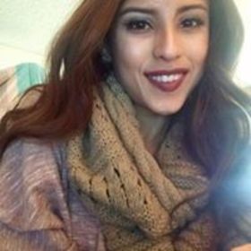 XENIA UMANZOR’s headshot.