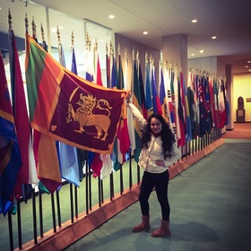 Chela Abeysekera’s headshot.