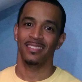 Roberto Cruz’s headshot.