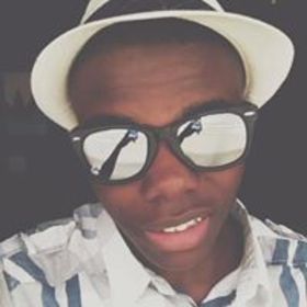 Malique Faulks’ headshot.