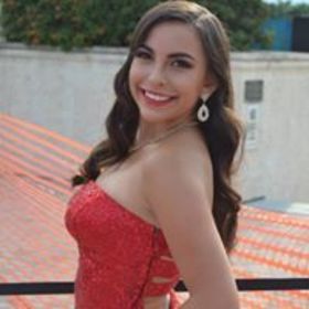 Yumi Rivas’ headshot.