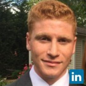 John Abrams’ headshot.