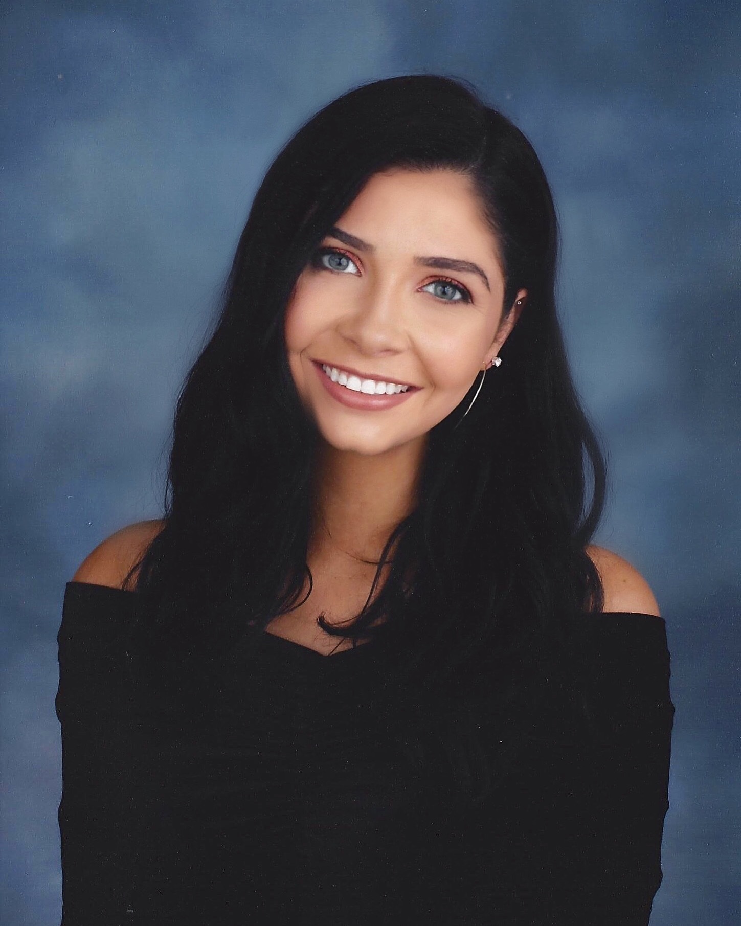 Placeholder headshot for Emily Grau.