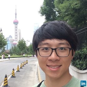 Wei He’s headshot.