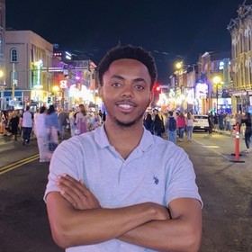 Amenti Bonja’s headshot.