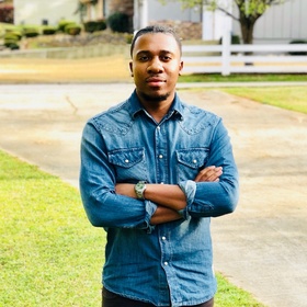 Dustin Shaw’s headshot.