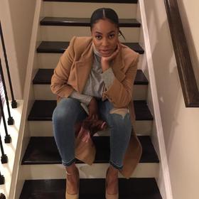 Asisha Iriemi’s headshot.