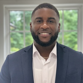 Brandon Kirby’s headshot.