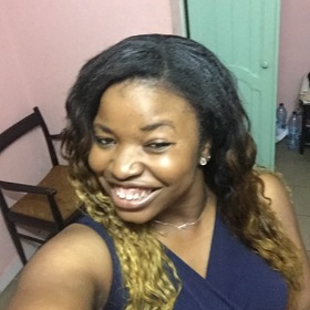 Nelly Ekouba’s headshot.