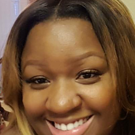 Tiffini Oglesby’s headshot.