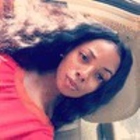 Aysha Simmons’ headshot.