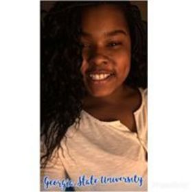 Roncha Woody’s headshot.