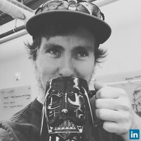 Andrew Grexa’s headshot.